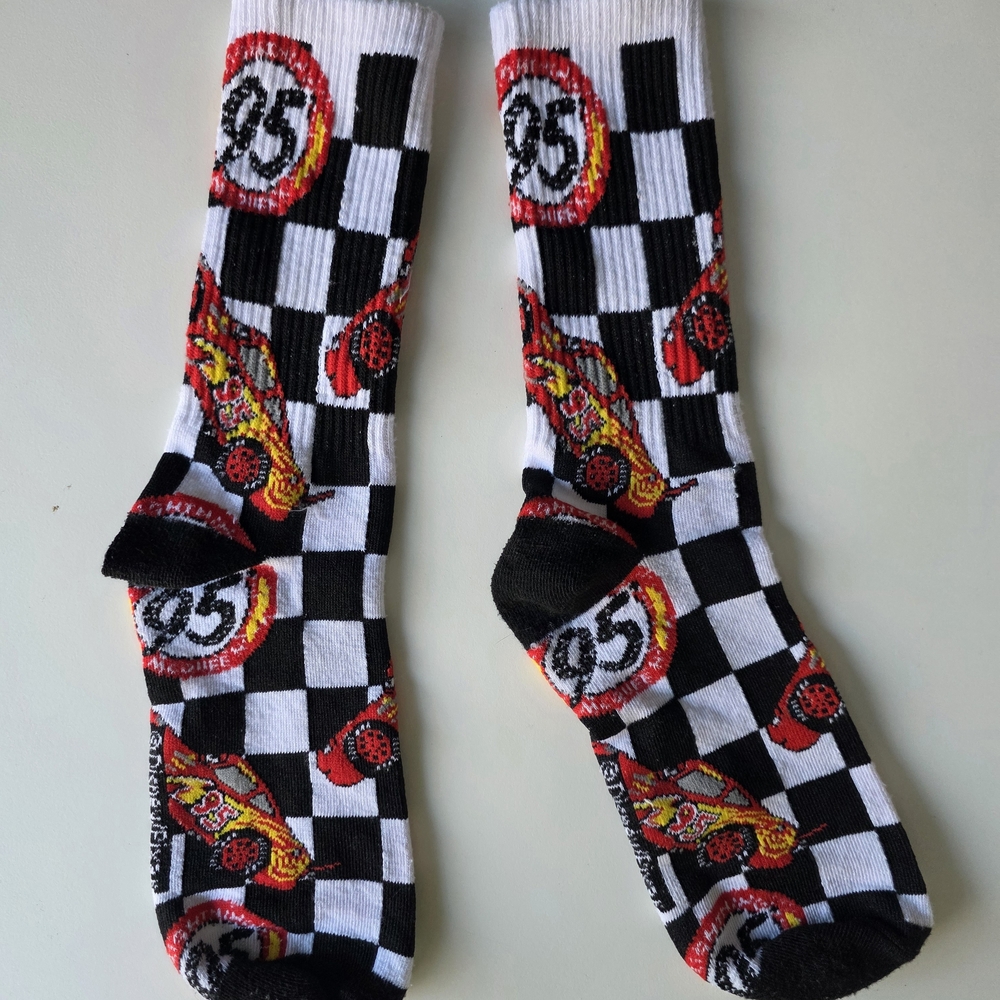 Checkered Black and White Socks with Red Car Design